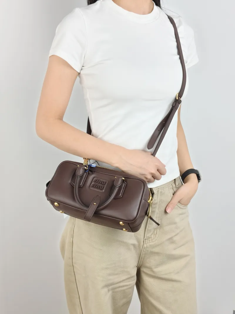 Miumiu Top Handle Bag Arcadie Collection Bowling Bag CC alfskin Medium 22 × 7.5 × 10.5 cm — on-model view 2 of 3