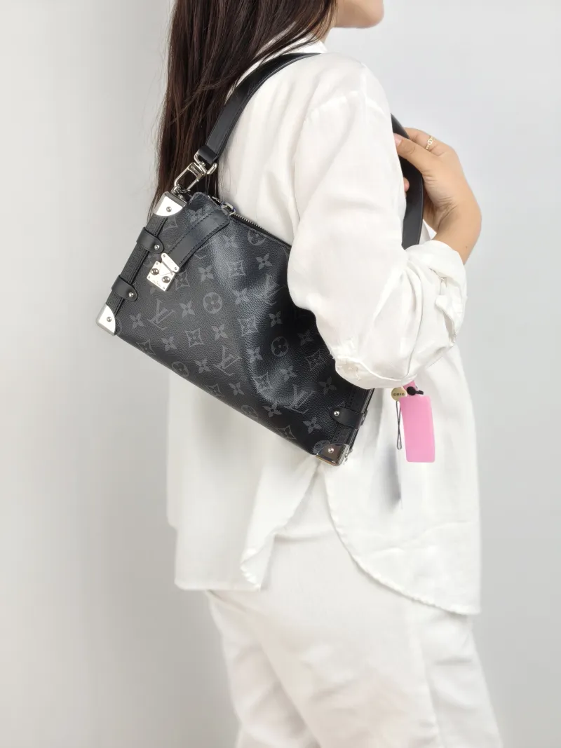 Louis Vuitton Crossbody Bag Side Trunk East West Box Monogram PVC Medium 28 × 7 × 15 cm — on-model view 1 of 2