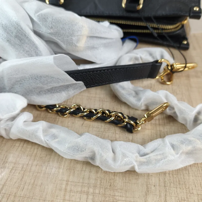 Louis Vuitton Crossbody Bag Onthego East West Two Straps Black Empreinte Embossed Calfskin Small 25 × 10 × 13 cm — detail view 11 of 12