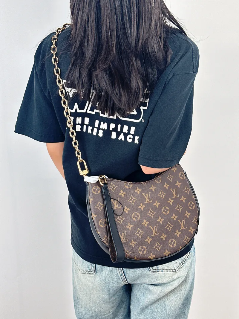 Louis Vuitton Shoulder Bag COOKIE Monogram PVCBB28.5 × 5 × 19 cm — on-model view 1 of 2