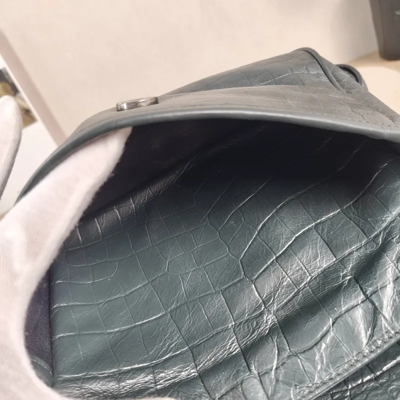 SAINT LAURENT Crossbody Bag Niki D Green Waxed Leather Medium 28 × 8.5 × 20 cm — detail view 11 of 11