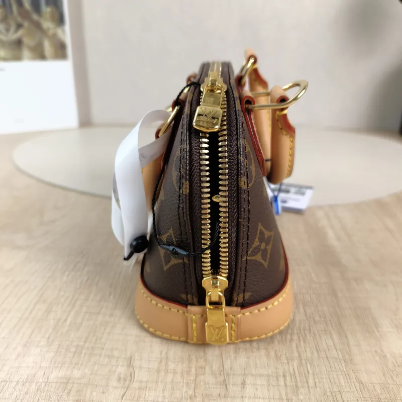 Louis Vuitton Crossbody Bag Alma Nano Monogram PVC nano 18 × 8 × 12 cm — detail view 9 of 12