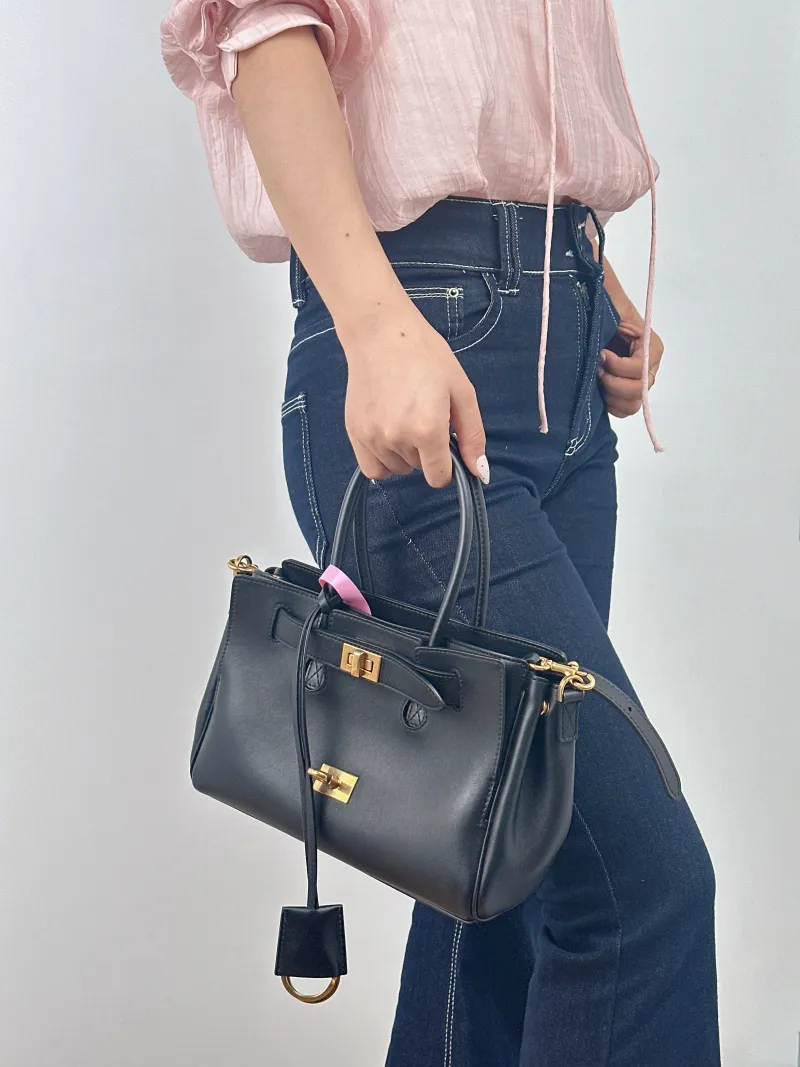 BALENCIAGA Crossbody Bag Bel air Black Calfskin Mini 23.5 × 8 × 17 cm — on-model view 2 of 2