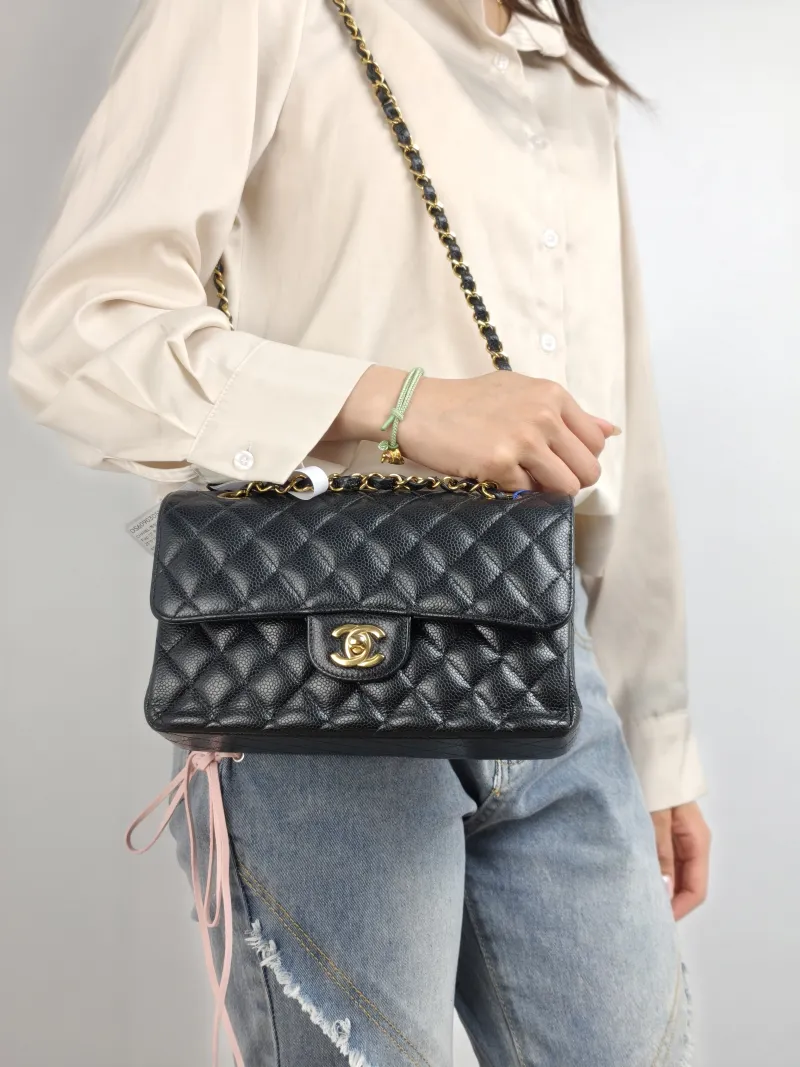 Chanel Crossbody Bag Classic Flap CF Black Grained Calfskin Small 23 × 6 × 14.5 cm — on-model view 1 of 2