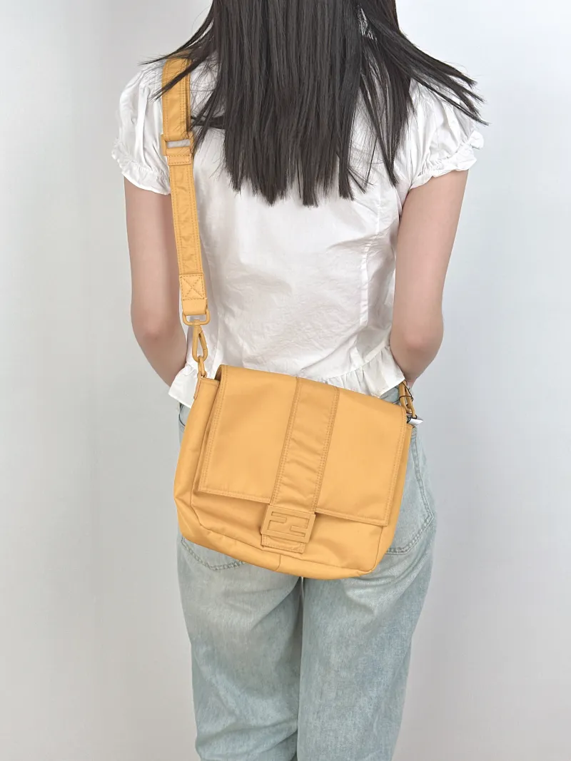 FENDI Crossbody Bag Crossbody Bag Yellow Nylon One Size23 × 7 × 22 cm — on-model view 1 of 3