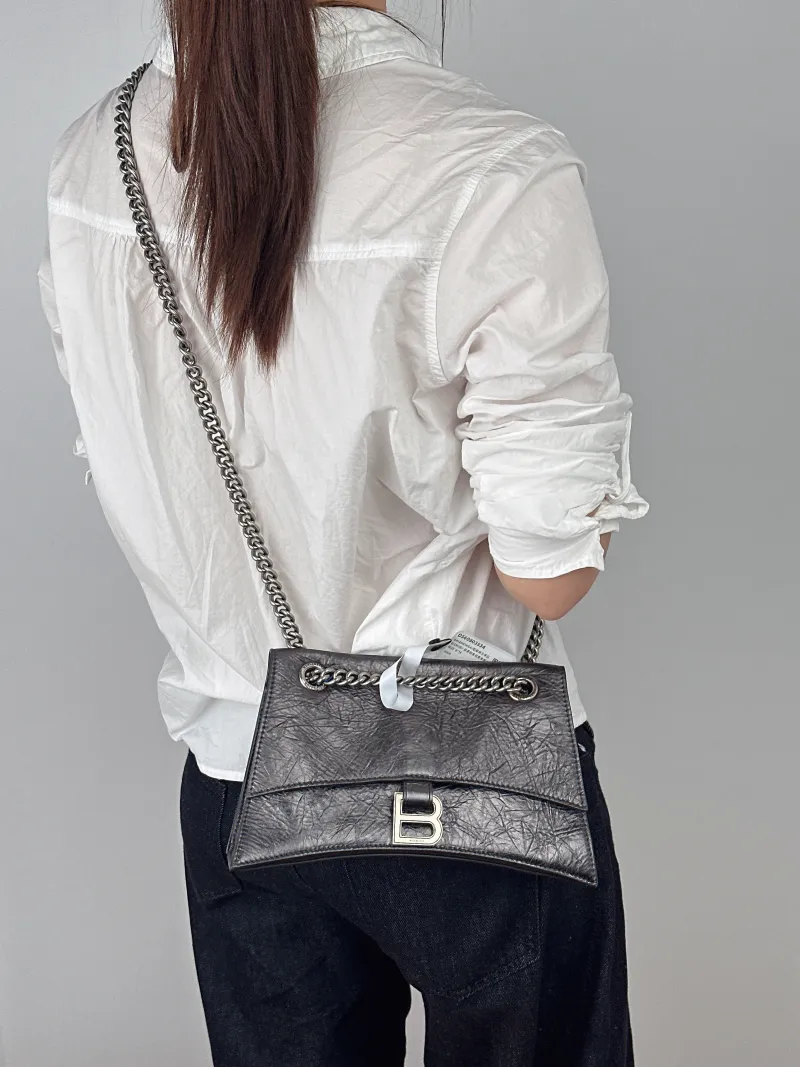 BALENCIAGA Shoulder Bag CRUSH Chain Bag Calfskin Small25 × 8 × 15 cm — on-model view 1 of 2