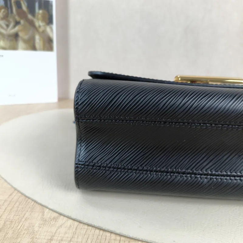 Louis Vuitton Crossbody Bag Twist Black Epi Embossed Calfskin Medium 23 × 9.5 × 17 cm — detail view 2 of 16