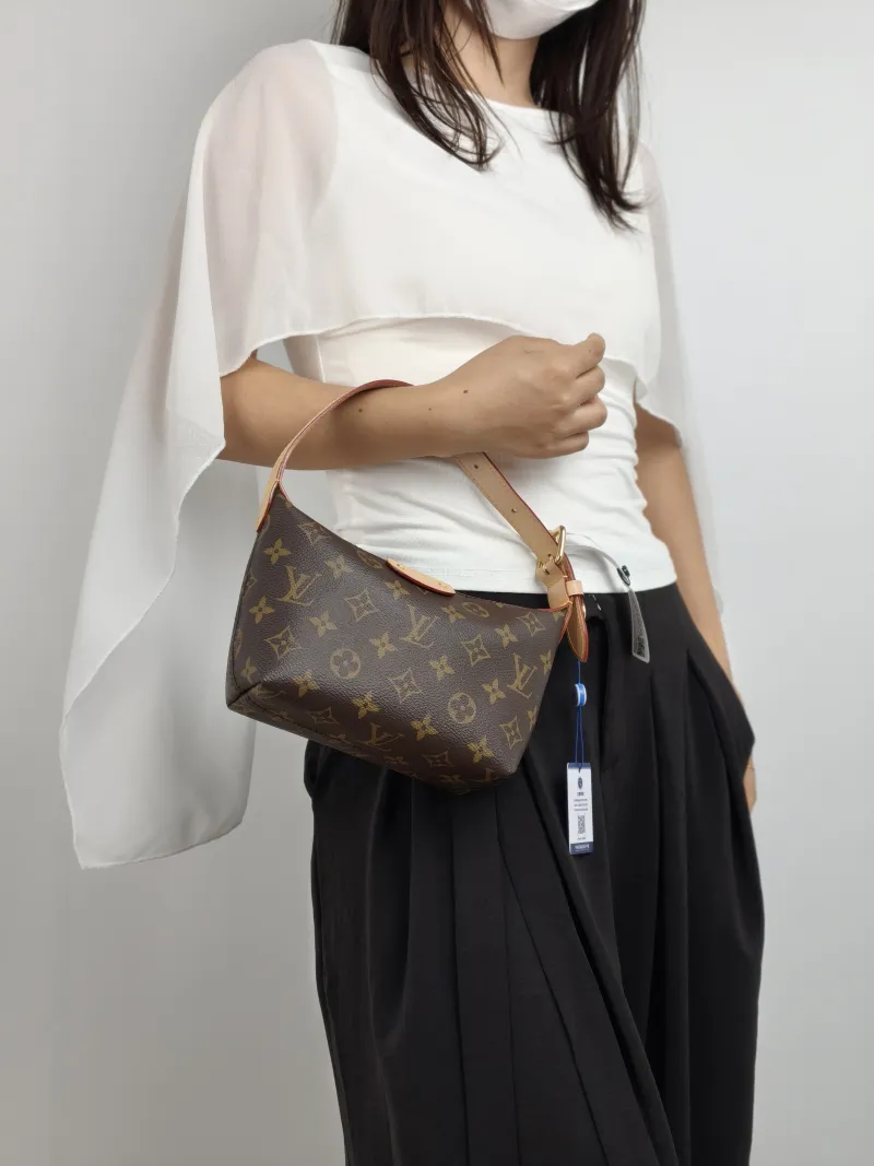 Louis Vuitton Shoulder Bag Pochette Hills Monogram PVC One Size 18.5 × 6.5 × 11 cm — on-model view 2 of 2