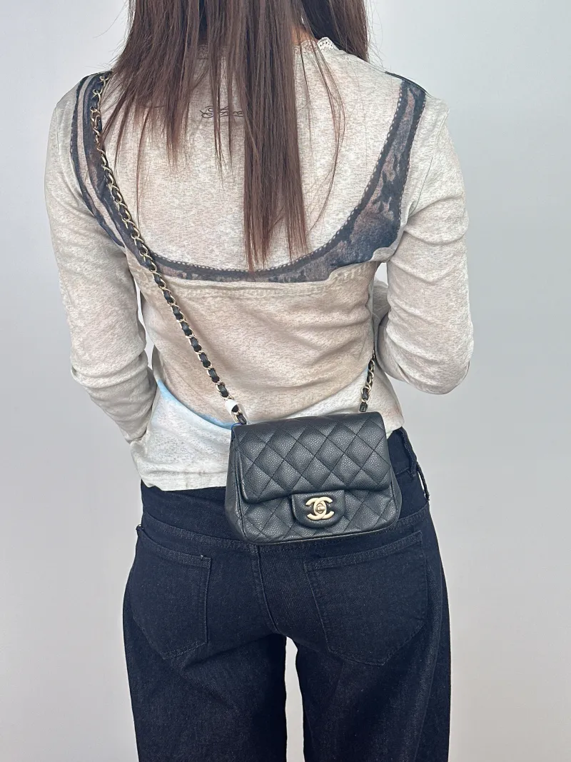 Chanel Crossbody Bag Classic Flap Mini CF Mini Black Grained Calfskin17 × 8 × 13.5 cm — on-model view 2 of 2