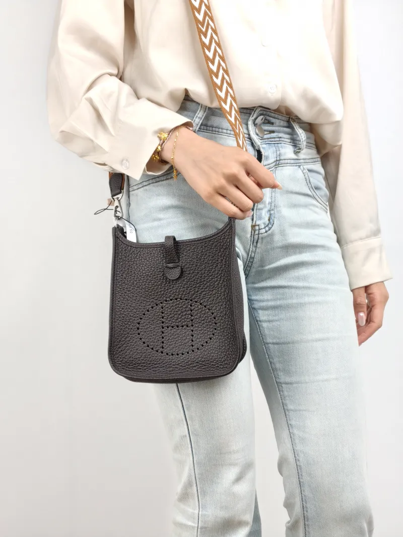 Hermès Crossbody Bag Evelyne Mini 16 Mini 16 TC Calfskin Mini 17 × 5.5 × 18 cm B — on-model view 1 of 2
