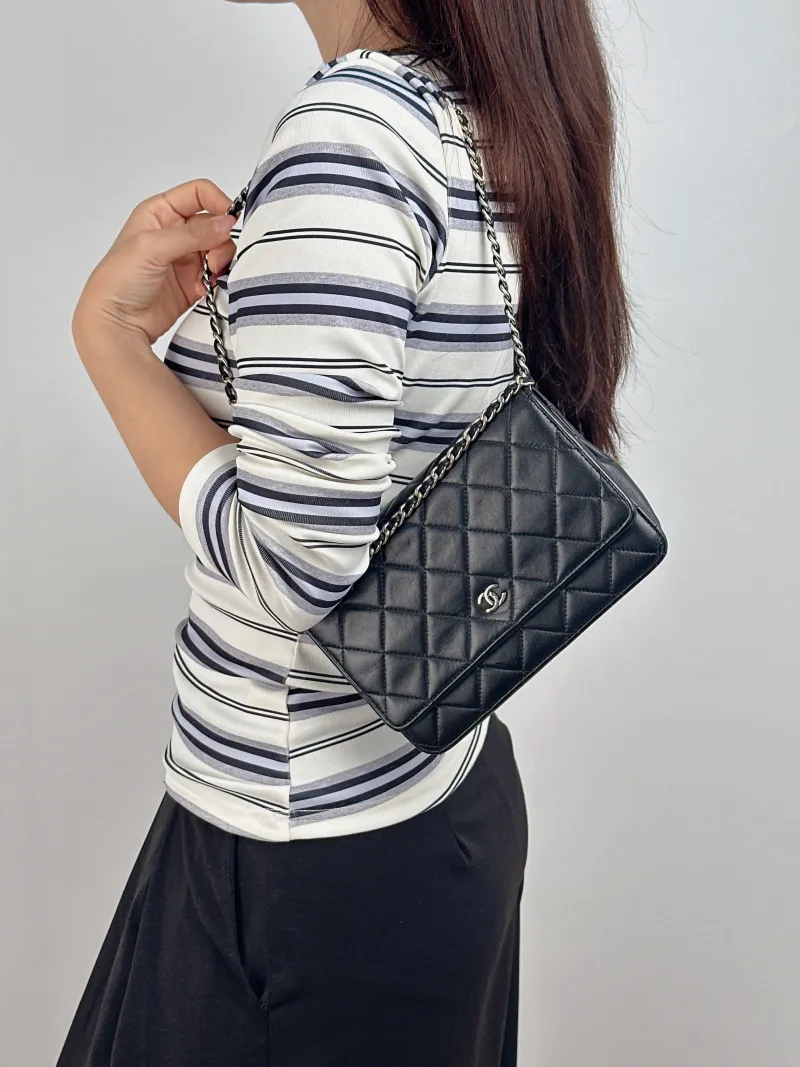 Chanel Crossbody Bag Classic Flap WOC CF WOCWOC Bag Black Lambskin Mini 19.2 × 3.5 × 12.3 cm 20 — on-model view 1 of 2