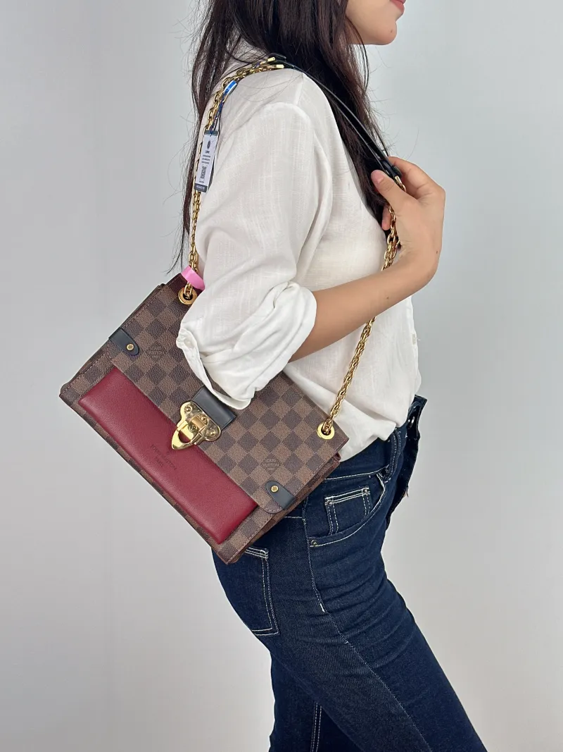 Louis Vuitton Shoulder Bag VAVIN Red · PVC Small 25 × 9.5 × 17 cm — on-model view 2 of 2