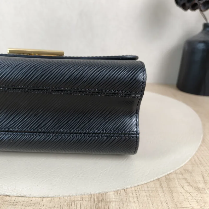 Louis Vuitton Crossbody Bag Twist Black Epi Embossed Calfskin Medium 23 × 9.5 × 17 cm — detail view 1 of 16