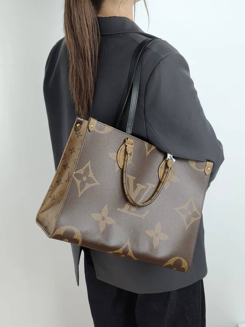 Louis Vuitton Shoulder Bag Onthego Medium Monogram PVC Medium 35 × 14 × 27 cm — on-model view 1 of 3