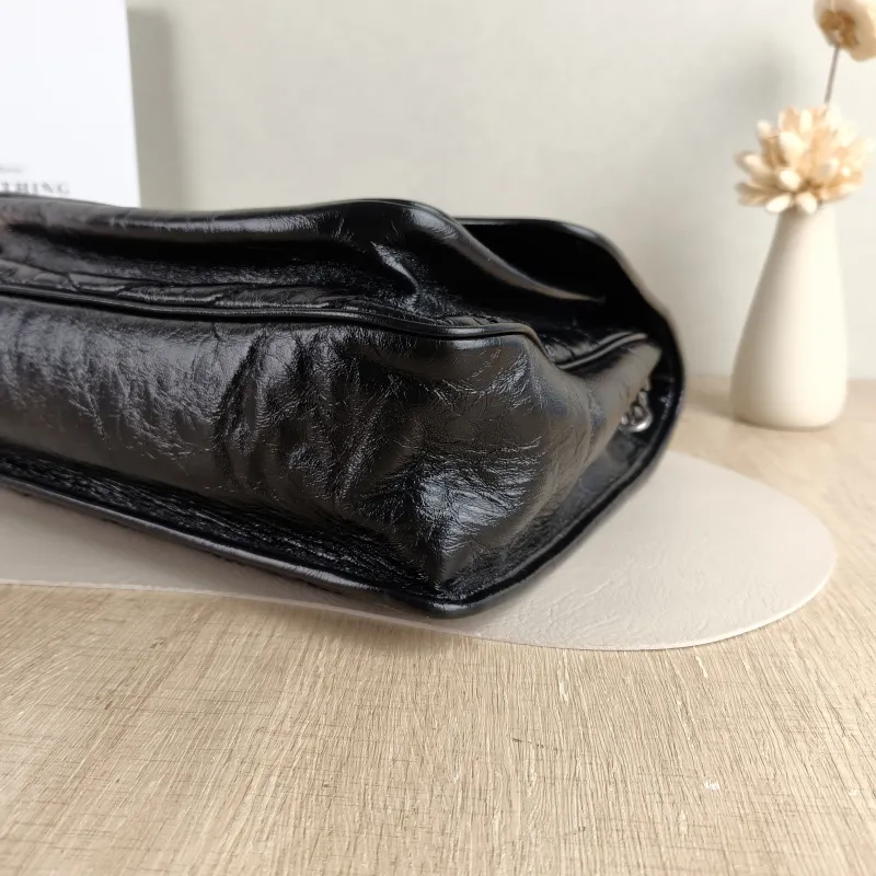 SAINT LAURENT Crossbody Bag Niki D Waxed Leather Calfskin Large 32 × 9 × 23 cm — detail view 3 of 13