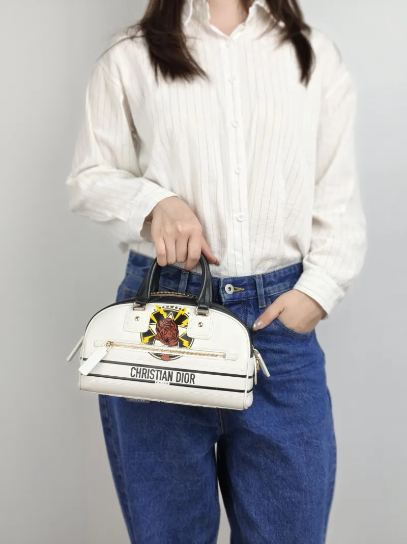 DIOR Top Handle Bag Vibe Bowling White Calfskin 25 × 11 × 15 cm — on-model view 1 of 2