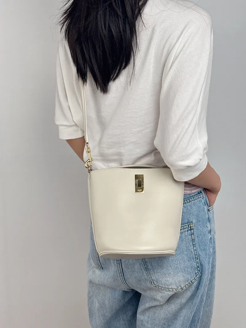 CELINE Crossbody Bag Bucket 16 Bucket Bag White Calfskin Small16 × 16 × 18 cm — on-model view 1 of 3