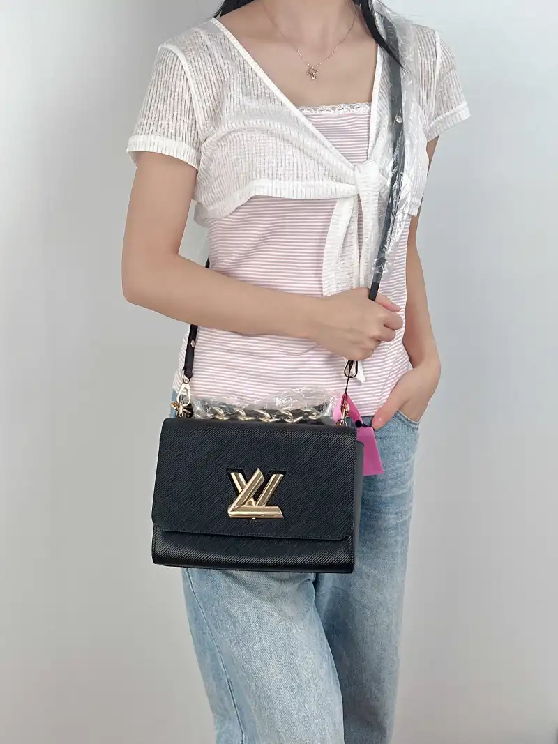Louis Vuitton Crossbody Bag Twist Black Epi Embossed Calfskin Medium 23 × 9.5 × 17 cm — on-model view 3 of 3