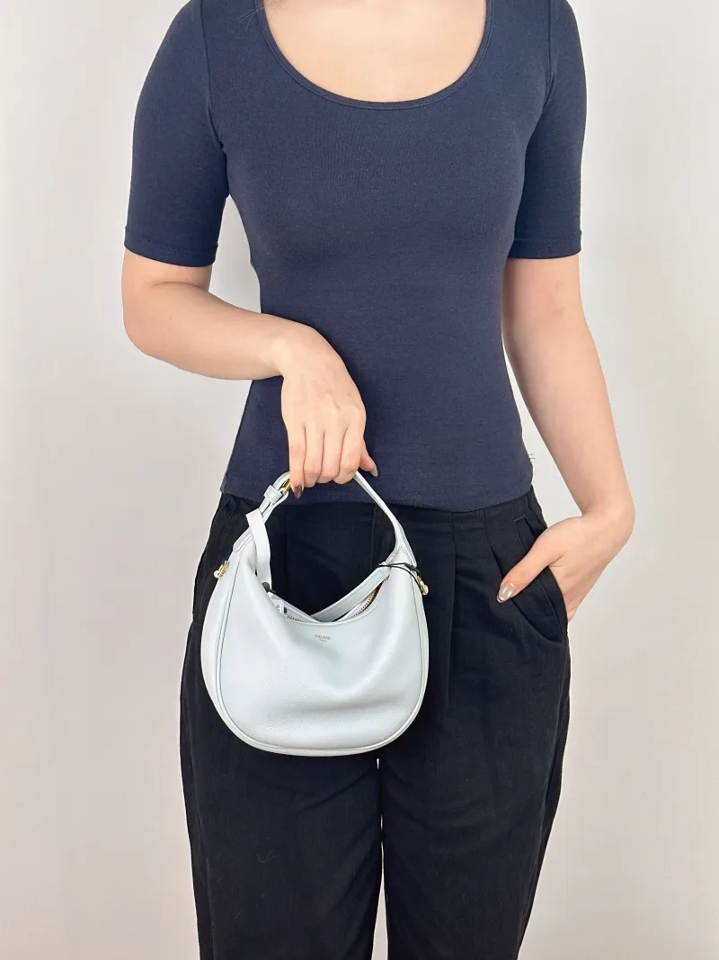 CELINE Crossbody Bag TEEN LULU hobo Blue Calfskin Small 21 × 5 × 24 cm — on-model view 1 of 2