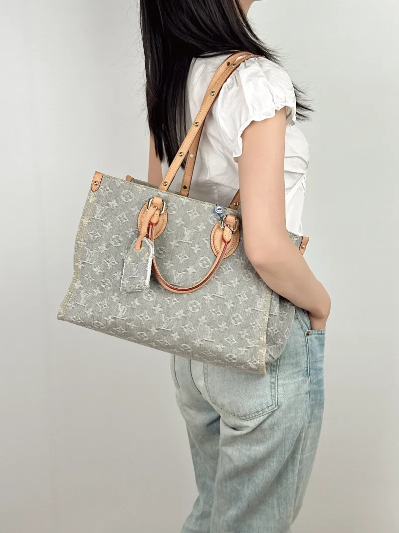 Louis Vuitton Shoulder Bag Onthego Medium Grey Medium 35 × 14 × 27 cm — on-model view 1 of 2
