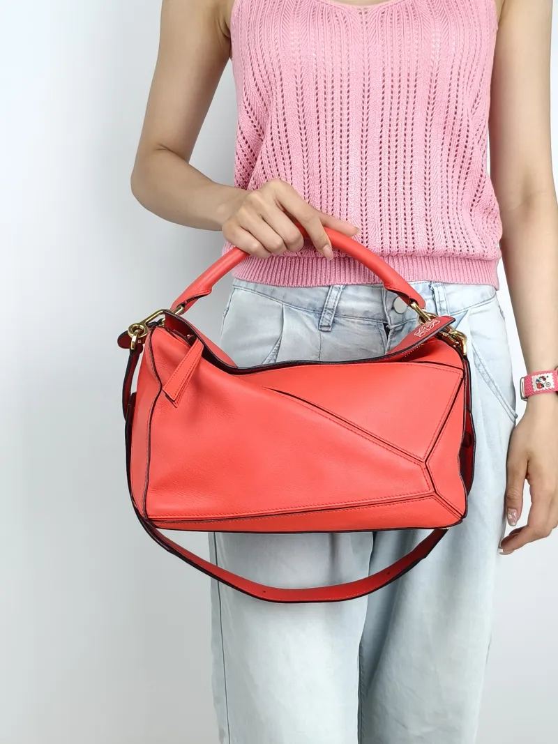 LOEWE Crossbody Bag Puzzle Red Calfskin Medium29 × 14 × 19.5 cm — on-model view 3 of 3