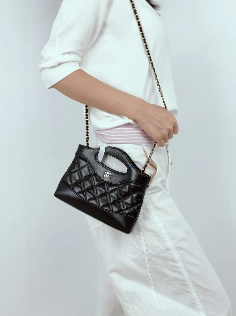 Chanel Shoulder Bag31Bag Black Waxed Leather Calfskinnano20.5 × 3.5 × 17 cm — on-model view 1 of 3