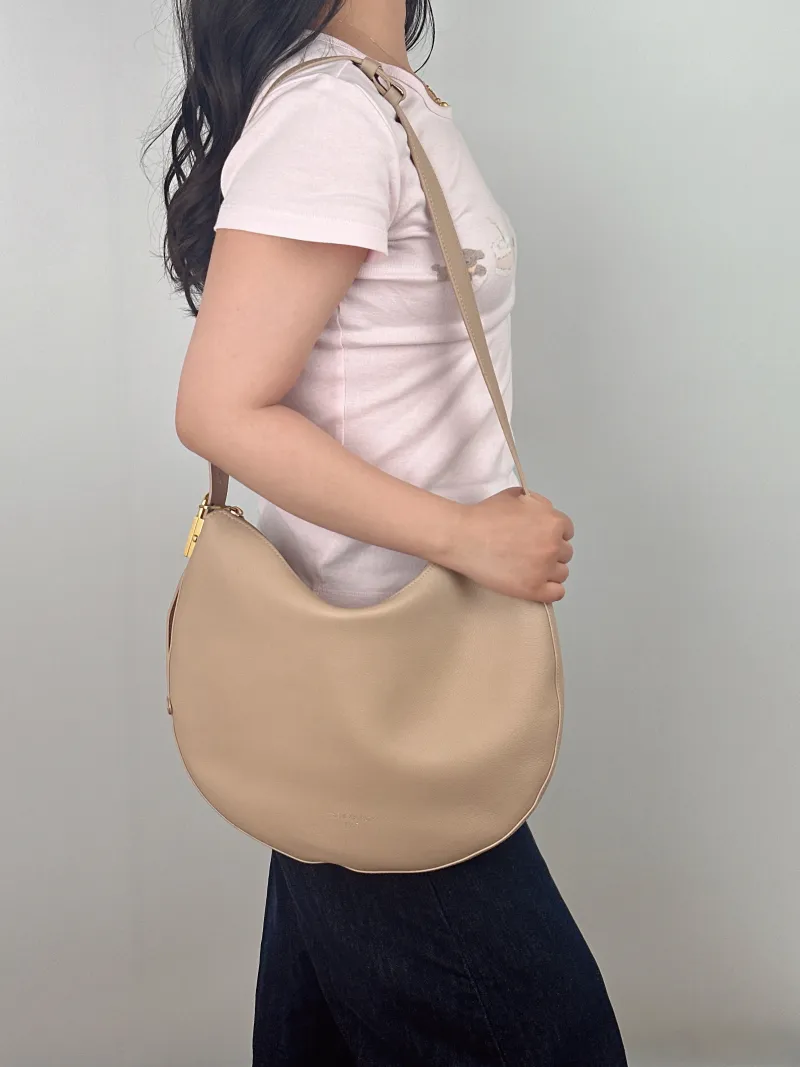 Louis Vuitton Shoulder Bag LOW KEY COOKIE Pink Calfskin Medium 32 × 5 × 26 cm — on-model view 1 of 2
