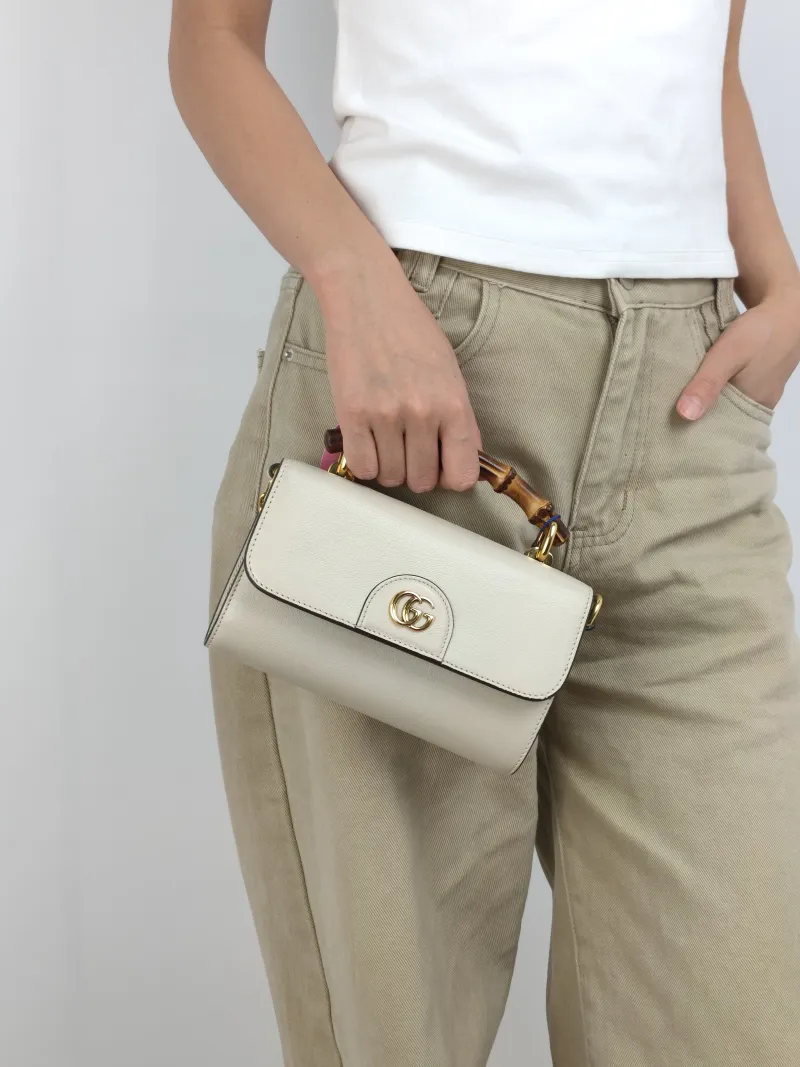 GUCCI Crossbody Bag Diana Crossbody Bag White Calfskin Mini 18.5 × 4 × 11 cm — on-model view 3 of 3
