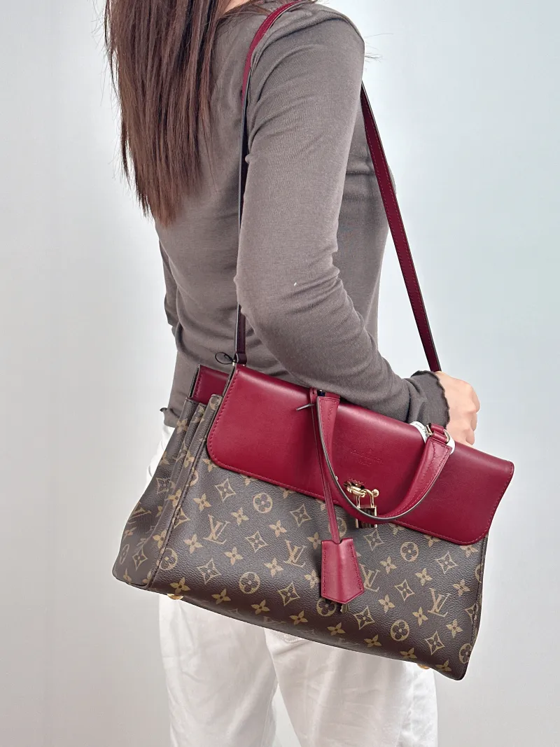 Louis Vuitton Shoulder Bag Venus Red PVC · Calfskin 34 × 12 × 22 cm — on-model view 1 of 2