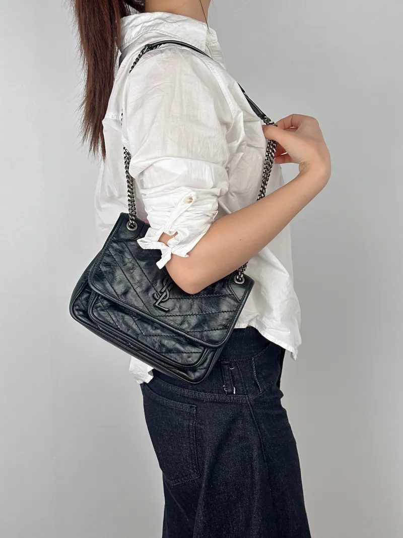 SAINT LAURENT Crossbody Bag Niki D Waxed Leather Calfskin Small21 × 7.5 × 16 cm — on-model view 2 of 2