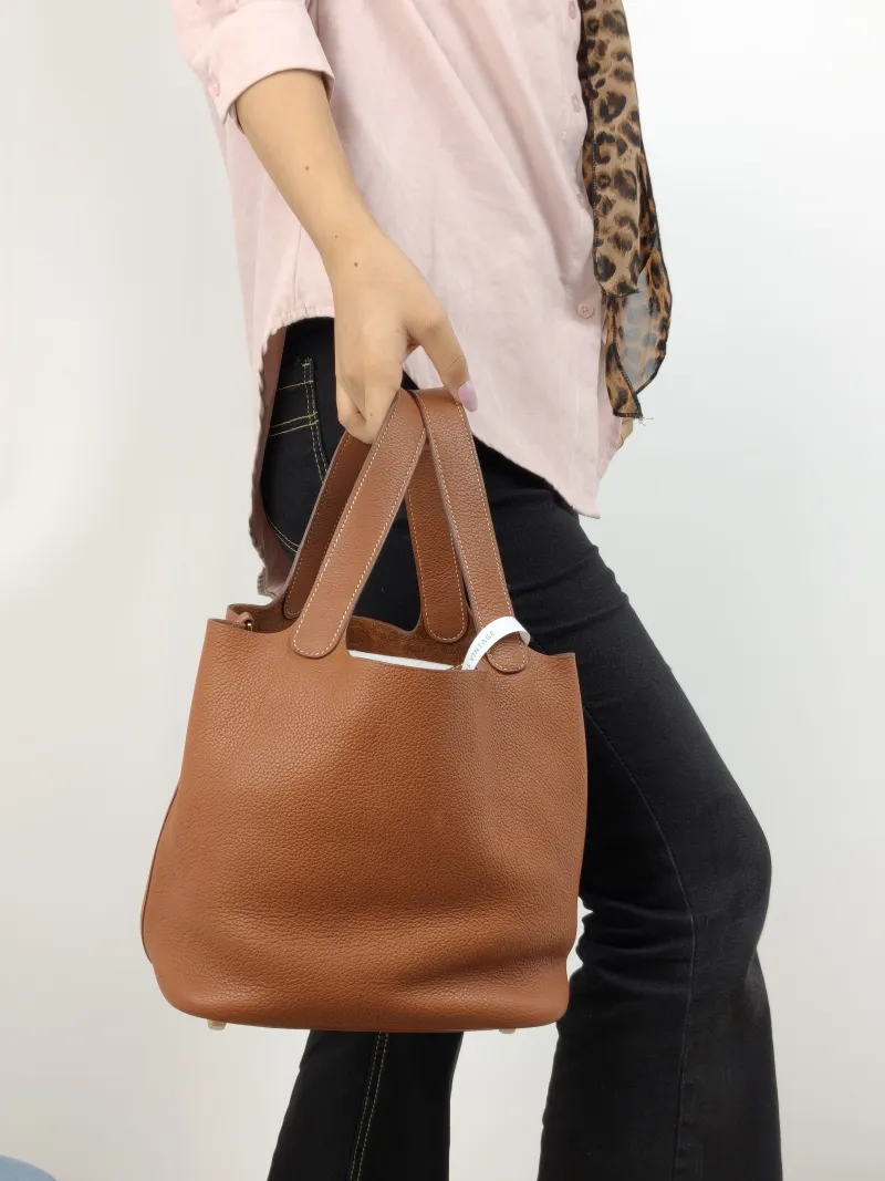 Hermès Top Handle Bag Picotin Lock 22 22 Taurillon Clemence TC Calfskin Medium 22 × 18 × 21 cm W Conditioned — on-model view 1 of 2