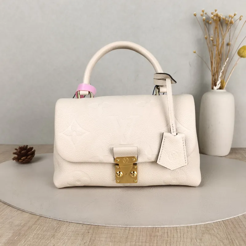 Louis Vuitton Crossbody Bag MADELEINE White Monogram Empreinte Embossed Calfskin BB 24 × 8.5 × 17 cm