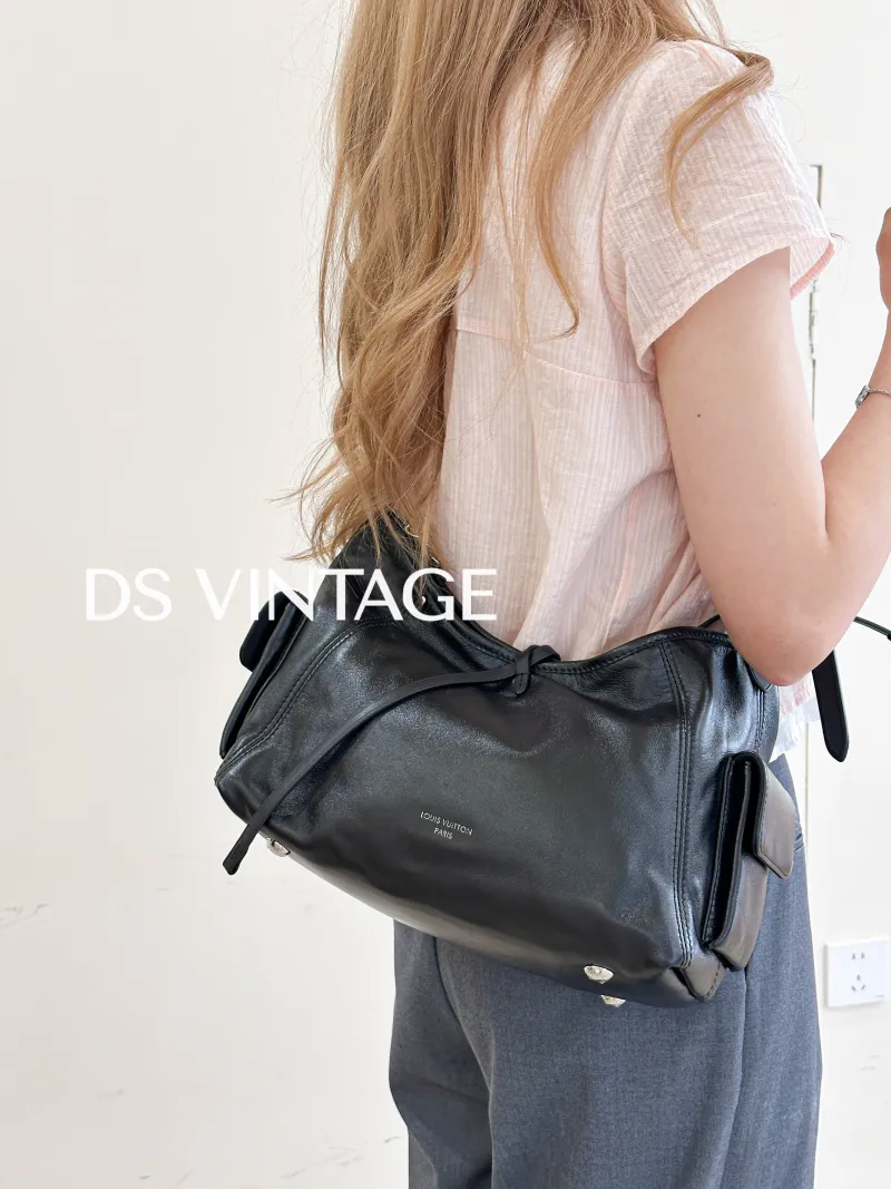 Louis Vuitton Crossbody Bag Carryall Cargo Vibe Black SL ambskin Small 33.5 × 15 × 23 cm — on-model view 3 of 3
