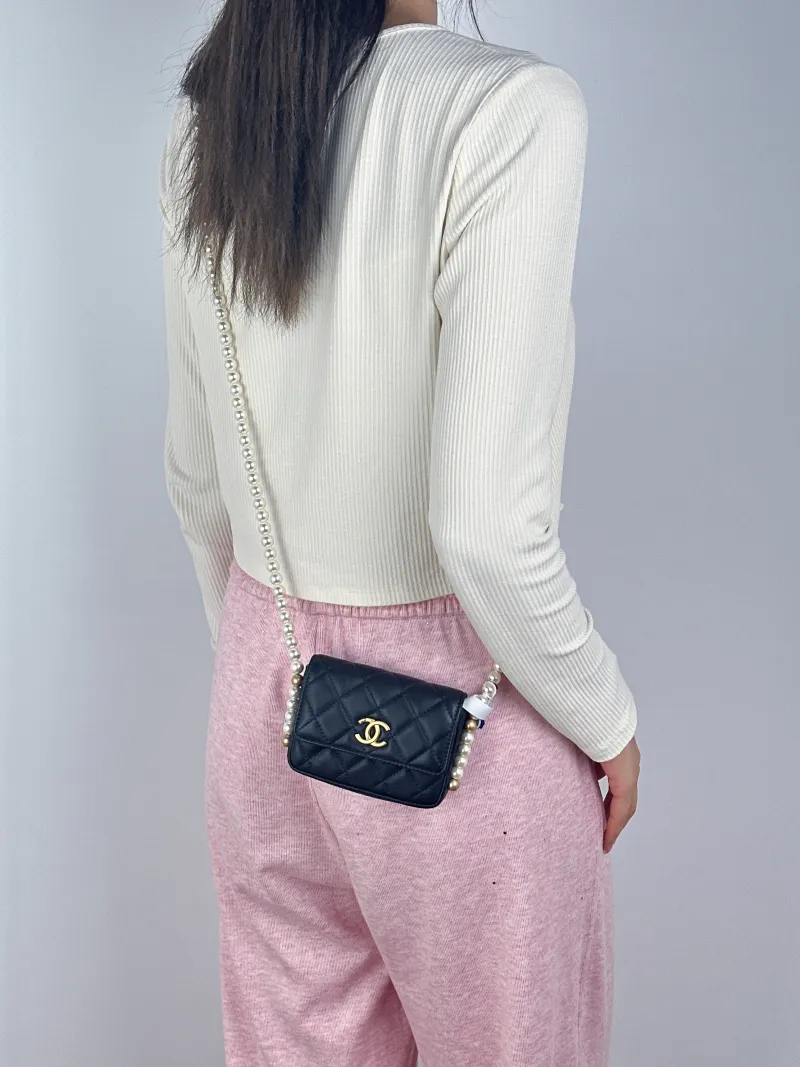 Chanel Crossbody Bag Pearl Crossbody Bag Black Calfskin One Size12 × 4 × 9 cm — on-model view 1 of 2