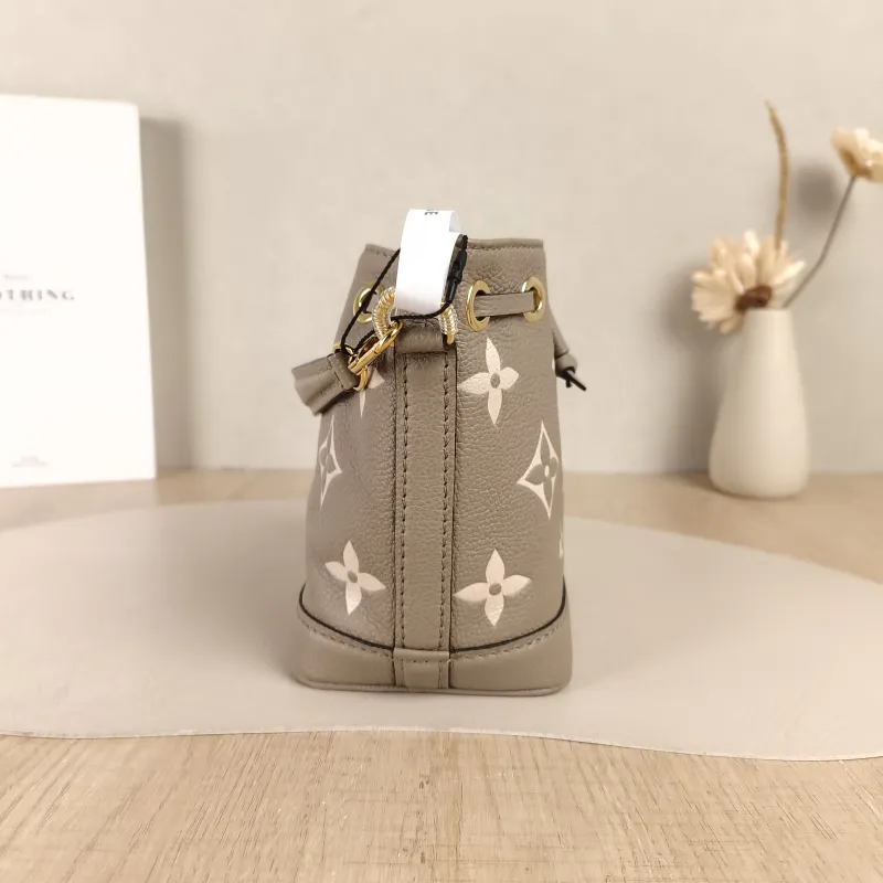 Louis Vuitton Crossbody Bag NANO NOÉ Bucket Bag Nano · White Empreinte Embossed Calfskin Monogramnano13 × 10 × 16 cm — detail view 11 of 11