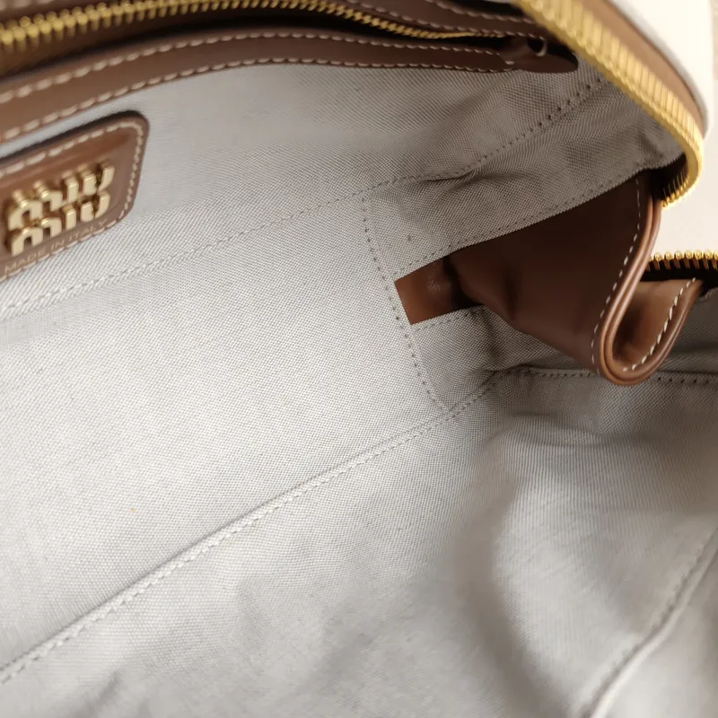 Miumiu Top Handle Bag Beau Brown Canvas · Calfskin 28 × 8 × 11.5 cm — detail view 2 of 13
