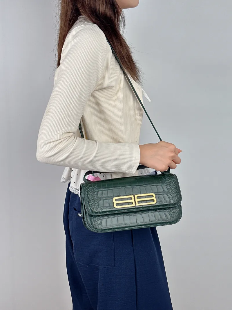 BALENCIAGA Shoulder Bag GOSSIP Green Calfskin Small 23.5 × 10.5 × 12.5 cm — on-model view 1 of 2