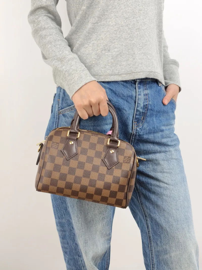 Louis Vuitton Crossbody Bag Speedy20 Shoulder Strap PVC Small 20.5 × 12 × 13.5 cm — on-model view 2 of 3
