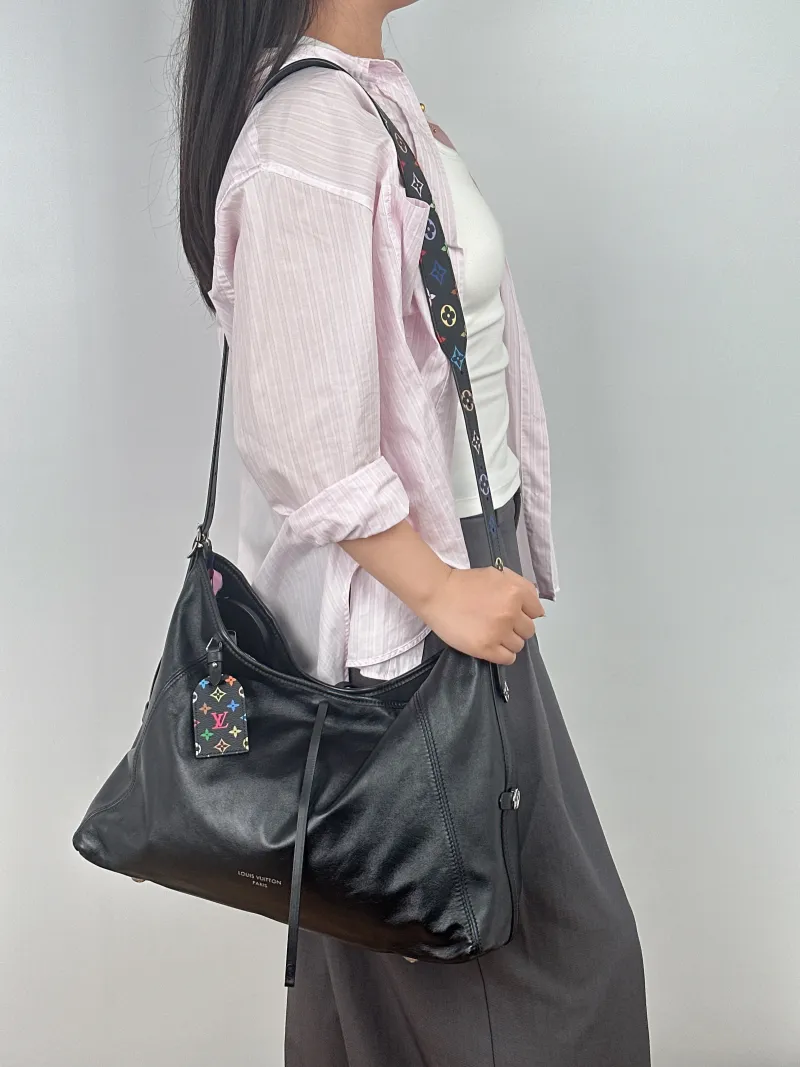 Louis Vuitton Crossbody Bag Carryall Vibe Black · Multicolore SL ambskin Medium 39 × 15 × 30 cm — on-model view 2 of 2