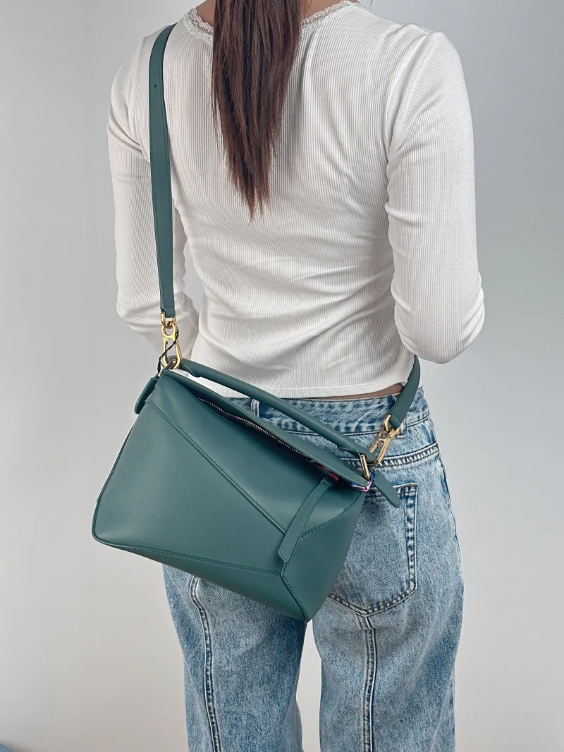 LOEWE Crossbody Bag Puzzle Green CC alfskin Small 24 × 10.5 × 16.5 cm — on-model view 1 of 3