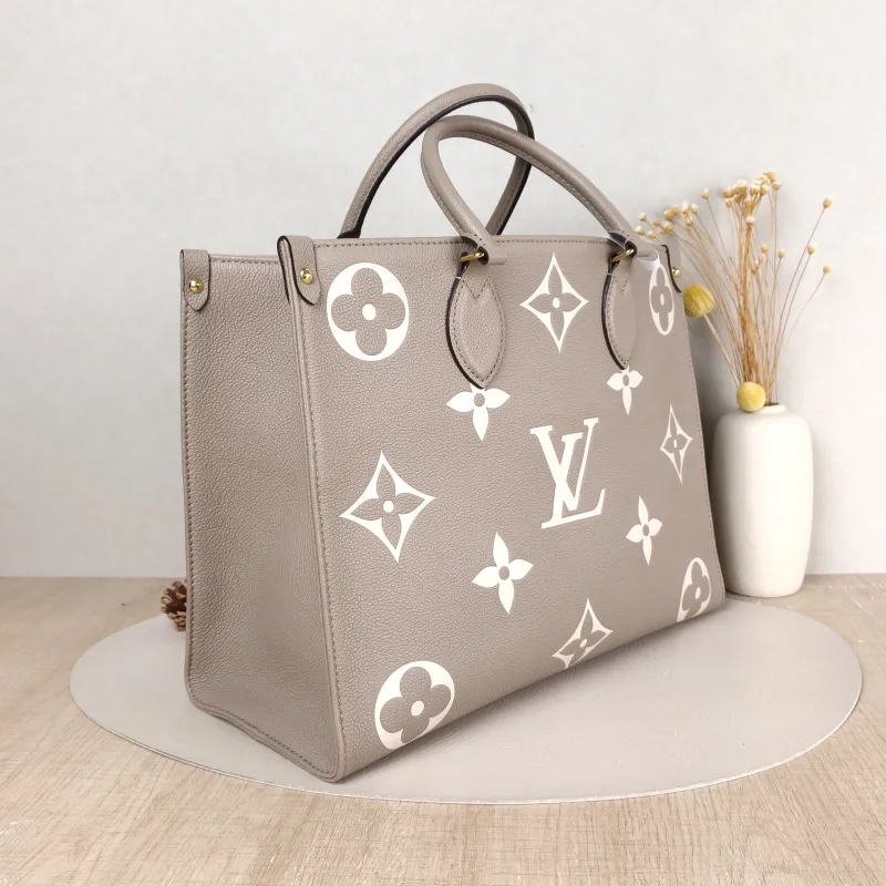 Louis Vuitton Shoulder Bag Onthego Medium · White Monogram Empreinte Embossed Calfskin Medium 35 × 14 × 27 cm — cover view 4 of 5