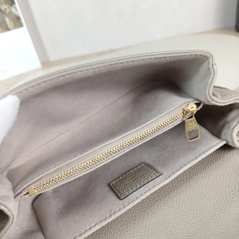 Louis Vuitton Crossbody Bag Pochette Métis East West Monogram Empreinte Embossed Calfskin Small 21.5 × 6 × 13.5 cm — detail view 9 of 12