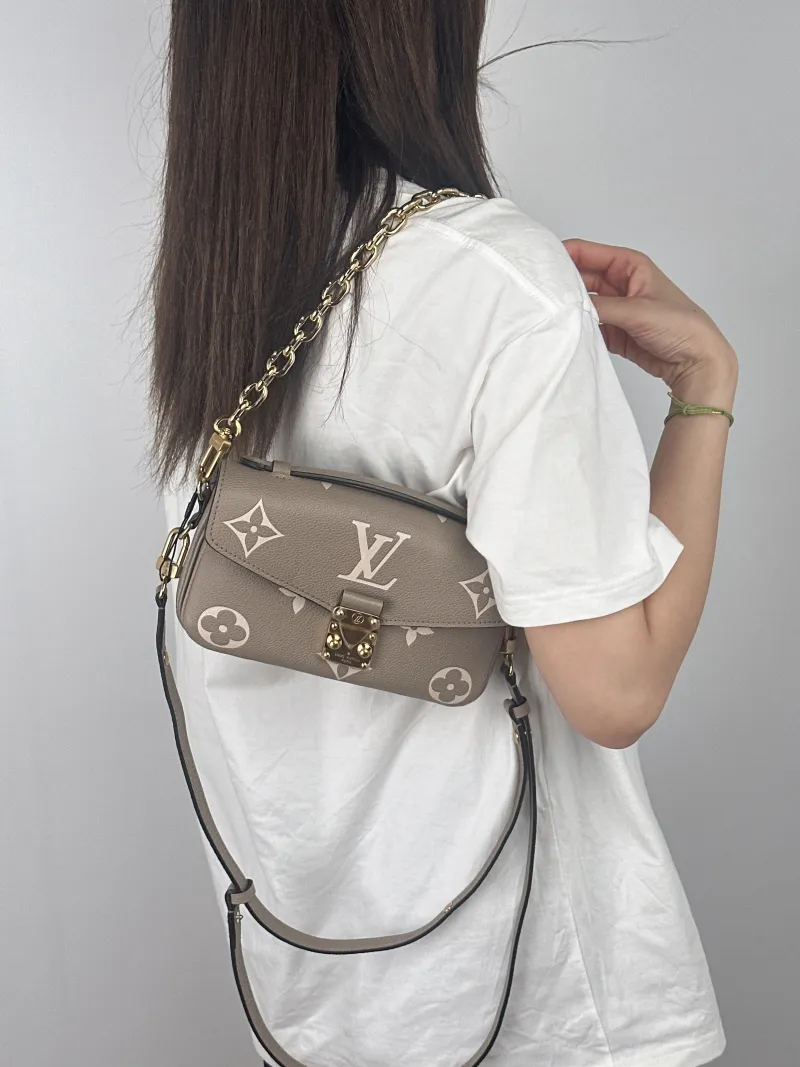 Louis Vuitton Crossbody Bag Pochette Métis East West Empreinte Embossed Calfskin Monogram Small21.5 × 6 × 13.5 cm — on-model view 2 of 3