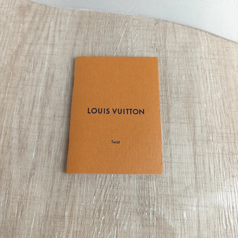 Louis Vuitton Crossbody Bag Twist Black Epi Embossed Calfskin Medium 23 × 9.5 × 17 cm — detail view 1 of 12