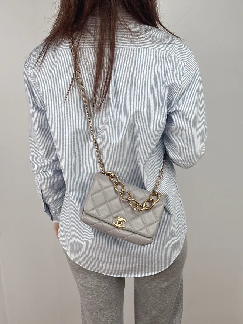 Chanel Crossbody Bag Grey Lambskin One Size 20 × 9 × 13.5 cm — on-model view 1 of 3
