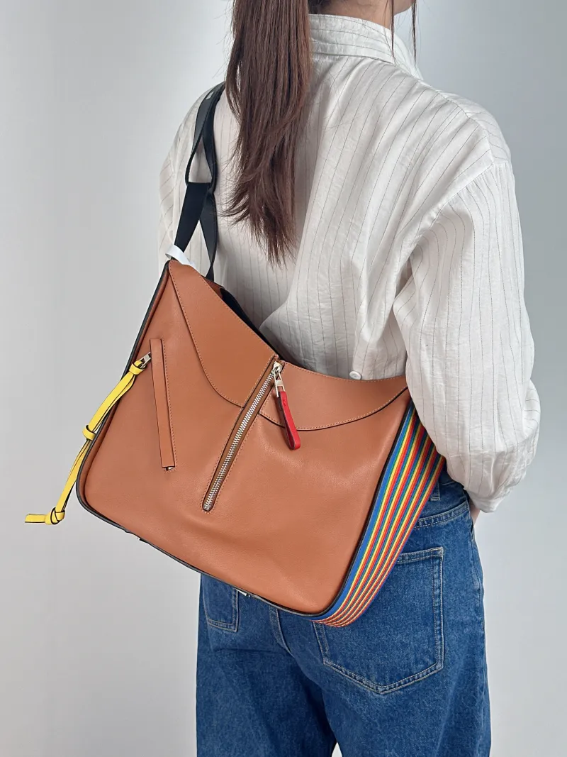 LOEWE Shoulder Bag Hammock Brown Calfskin Large 33 × 17 × 30 cm — on-model view 1 of 2