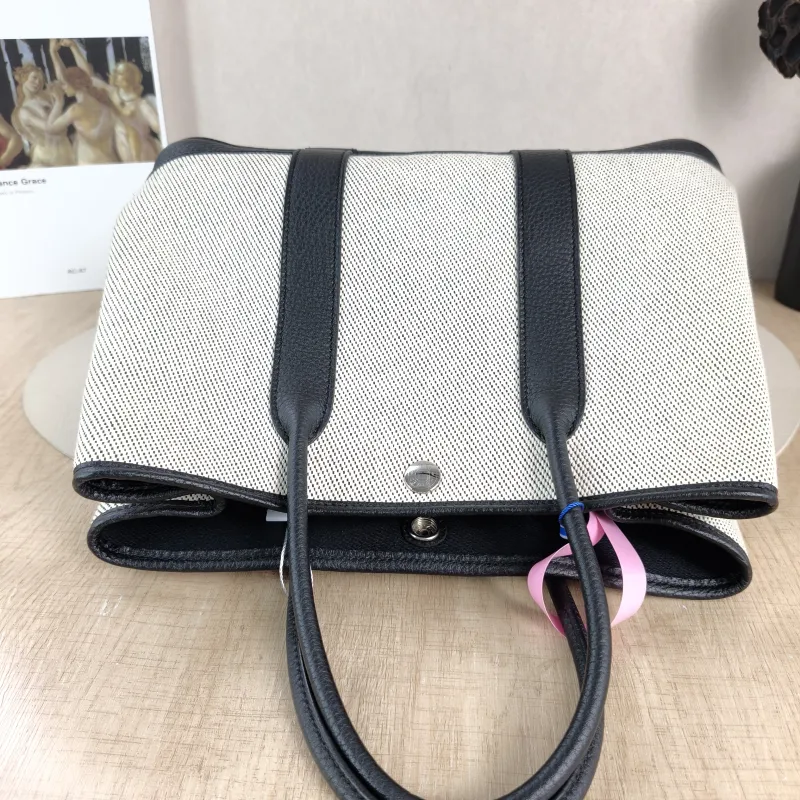Hermès Top Handle Bag Garden Party 30 30 Beige · Black Canvas · Negonda Calfskin Medium 30 × 13 × 21 cm B — detail view 9 of 10