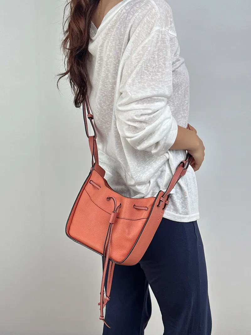 LOEWE Crossbody Bag Hammock Calfskinmini17 × 11 × 19.5 cm — on-model view 1 of 2