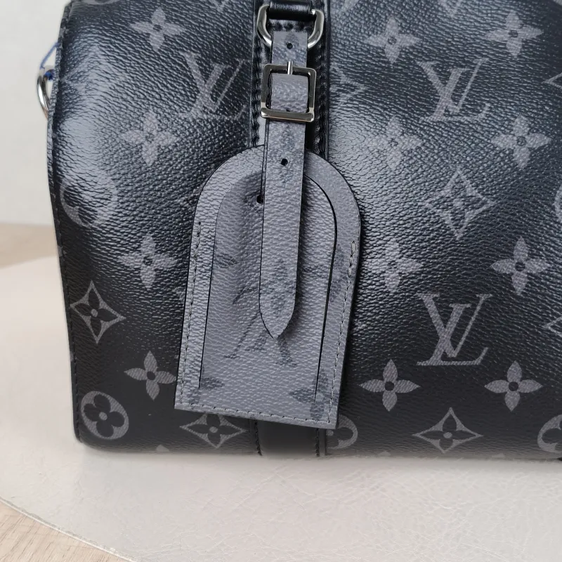 Louis Vuitton Crossbody Bag City Keepall Black PVC Medium 27 × 13 × 17 cm — detail view 1 of 12