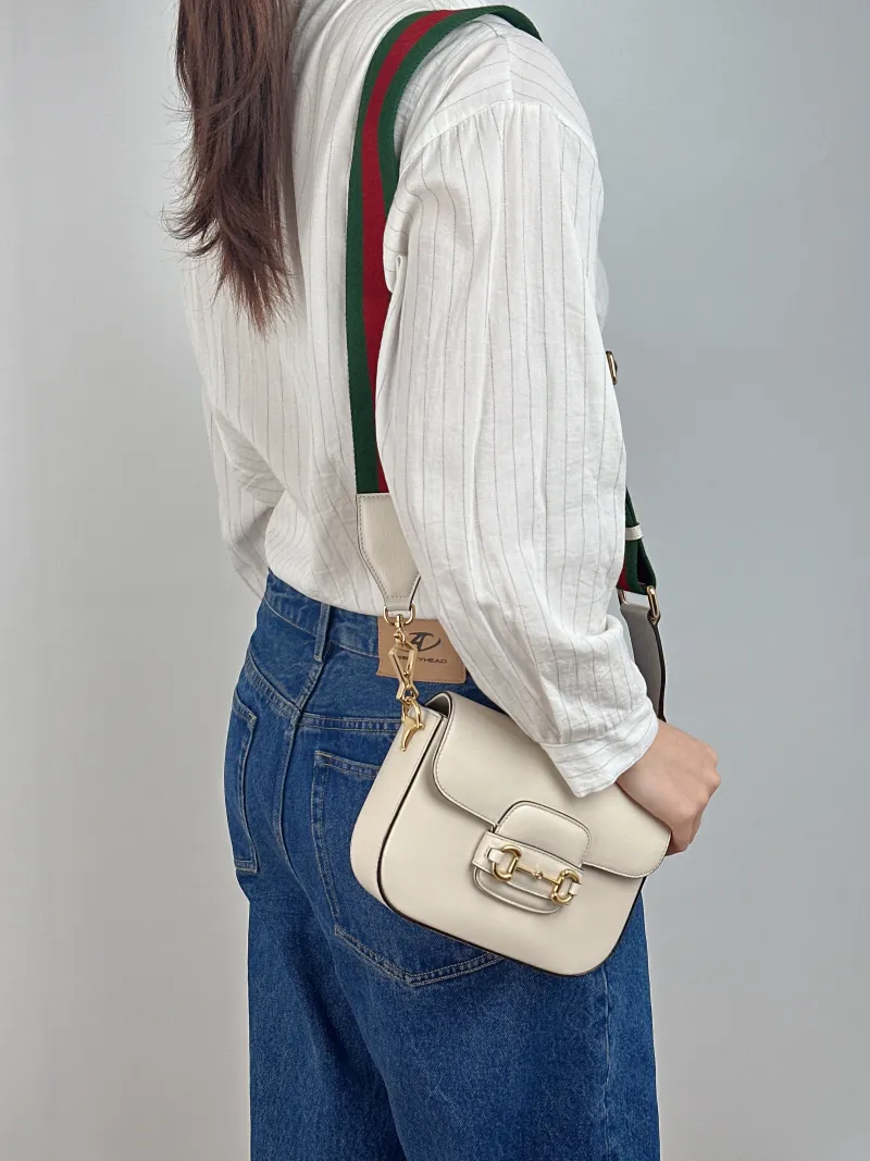 GUCCI Crossbody Bag Horsebit 1955 Horsebit Small White Calfskin Small 20.5 × 5 × 14.5 cm — on-model view 1 of 2